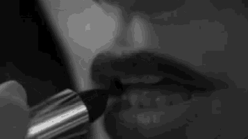 Applying Dark Lip Liner Sensually GIF