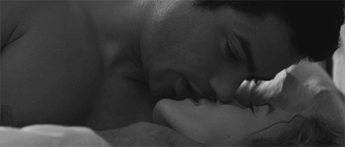 Close-Up Couple Share Tender Kiss GIF