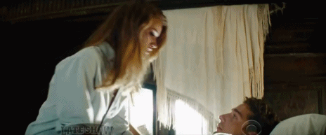 Couple Flirting In Bed GIF