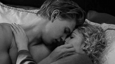 Cuddling in bed nose pressed together gif