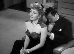 Dapper Man Adjusts Her Gown GIF