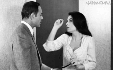 Flirtatious Black And White Kiss GIF