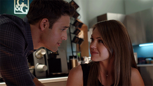 Flirtatious Intimate Gaze Couple GIF