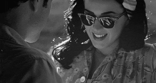 Playful Flirty Sunglasses Smile GIF