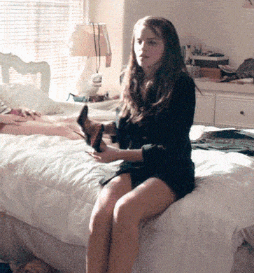 Flirty Bedroom Glance With Shoes GIF