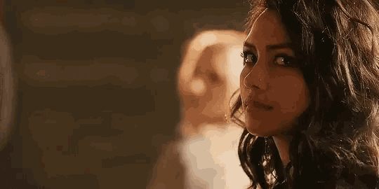 Flirty Over Shoulder Glance GIF