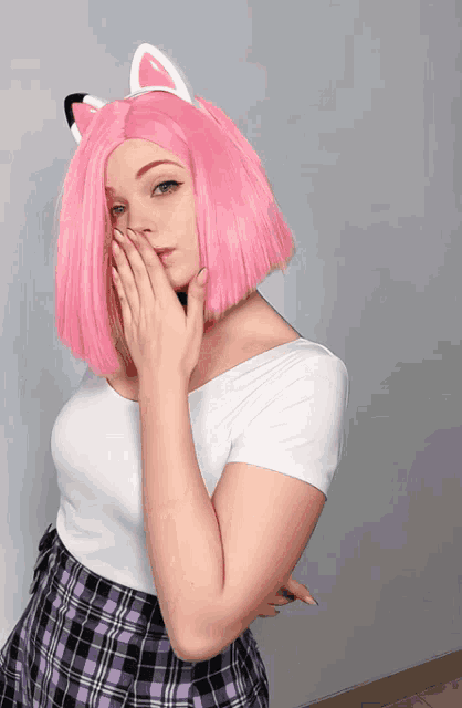 Flirty Woman Brushes Lips With Fingers GIF