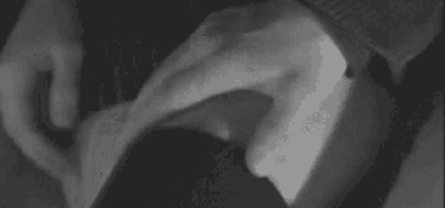 Intimate Hand Caressing Knee GIF