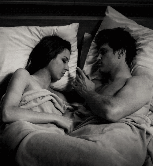 Holding hands in bed cute couple gif