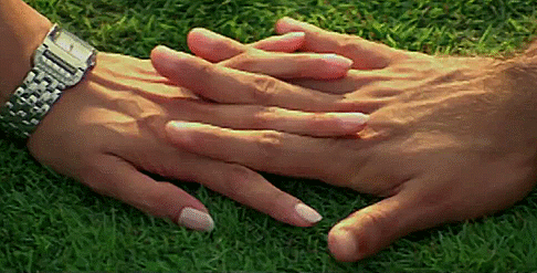 Intertwined Hands Loving Gesture GIF