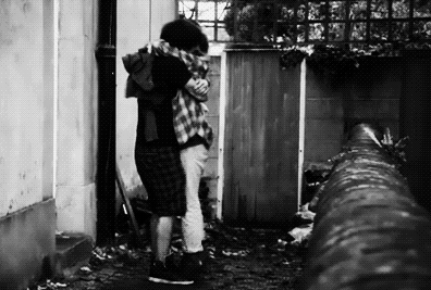 Intimate Alley Embrace Black And White GIF