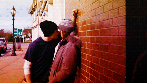 Intimate Brick Wall Kiss GIF