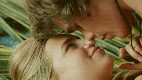 Intimate Gaze Before Gentle Kiss GIF