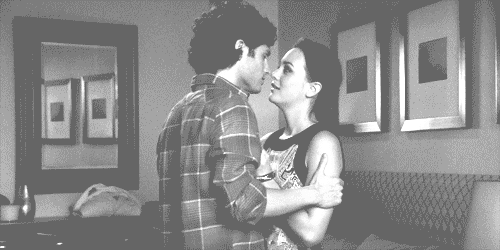Intimate Gaze Before Romantic Kiss GIF