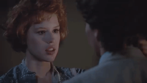 Intimate Gaze Leads To Passionate Kiss GIF