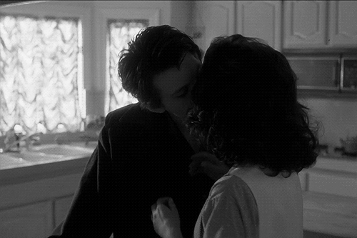 Passionate Intimate Kiss In Kitchen GIF