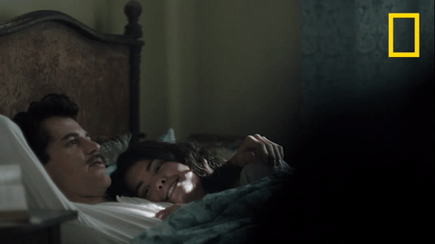 Loving Couple Cuddling In Bed GIF