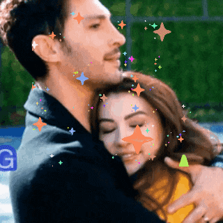 Loving Couple Hug GIF with Sparkles