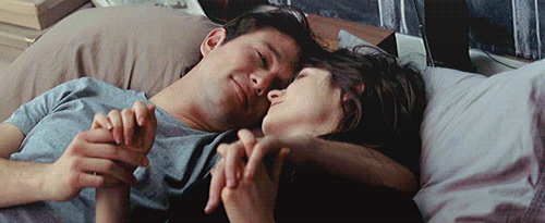 Cozy Embrace With Interlocked Fingers GIF