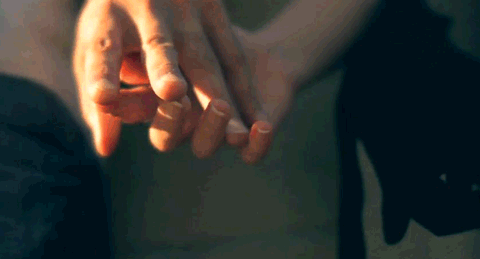 Loving Hands Intertwine Intimately GIF