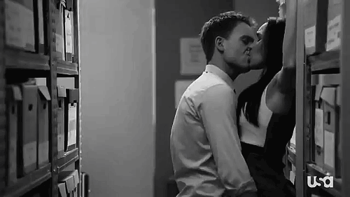 Making out pinned up against wall gif