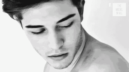 Man Flirty Gaze Over Shoulder GIF
