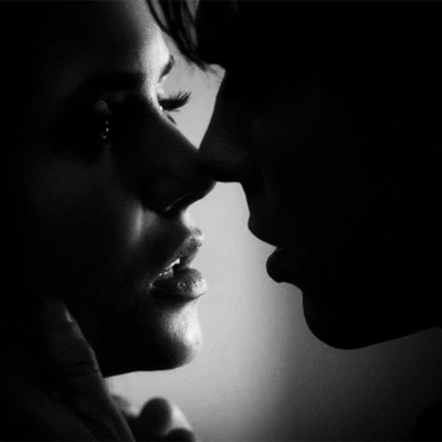 Passionate Almost Kiss GIF