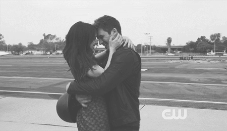 Passionate Embrace Kiss In Field GIF