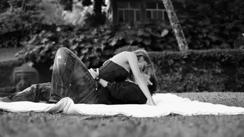 Passionate Flirtatious Kiss In Nature GIF