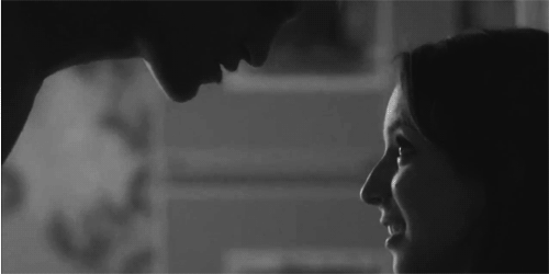 Passionate Gaze Before Kiss GIF