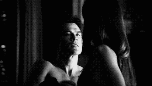 Passionate Gaze Leads To Intimate Kiss GIF