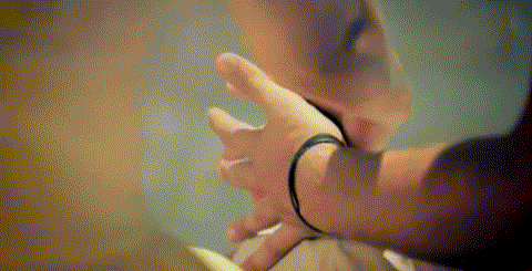 Passionate Intertwined Hands Caress GIF