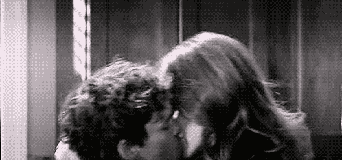 Passionate Couple Kissing Intimately GIF