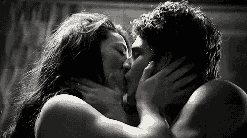 Passionate Couple Shares Intimate Kiss GIF