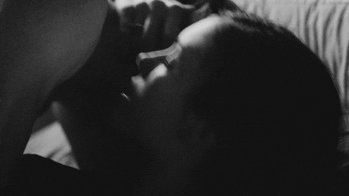 Passionate Couple Kissing Intimately GIF