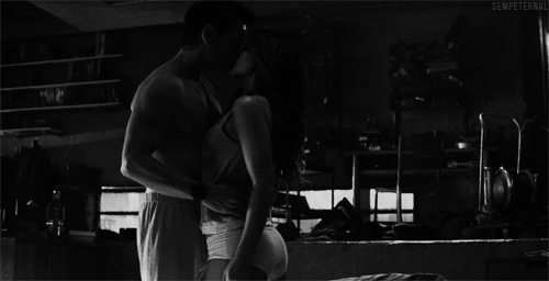 Passionate Intimate Kiss In Dim Light GIF