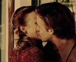 Passionate Kiss Shows Deep Affection GIF