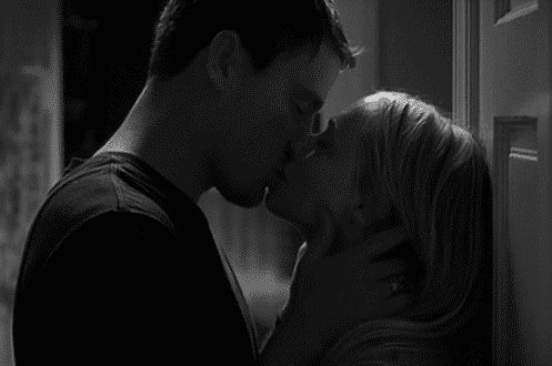 Passionate Kiss Ignites Deep Intimacy GIF
