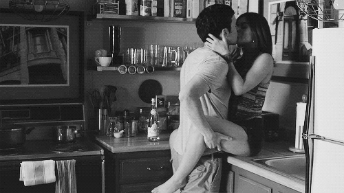 Passionate Kiss In Cozy Kitchen GIF
