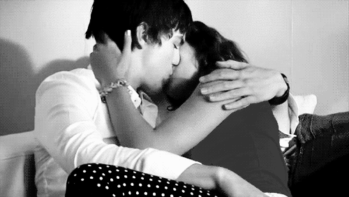 Passionate Kiss In Intimate Embrace GIF