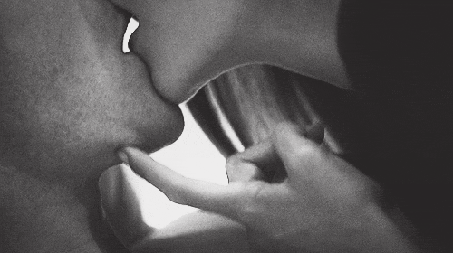 Passionate Kiss in Monochrome GIF