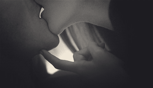 Passionate Kiss with Tender Touch GIF