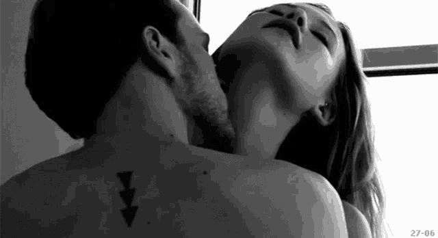 Passionate Neck Kiss In Black And White GIF