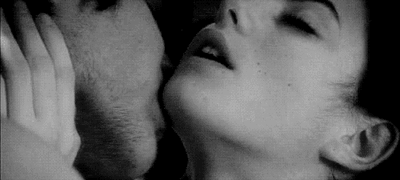 Passionate Neck Kiss Ignites Desire GIF