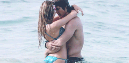 Passionate Ocean Kiss In Waves GIF