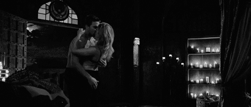 Passionate Romantic Kiss In Dim Light GIF