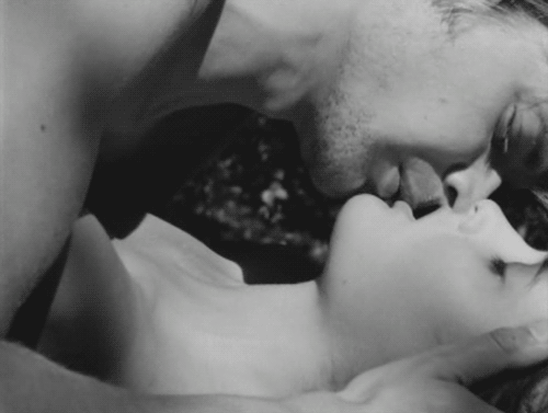 Passionate Kiss In Soft Focus GIF