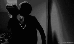 Passionate Silhouette Kiss GIF