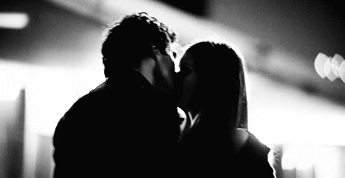 Pinned against wall seductive kiss gif