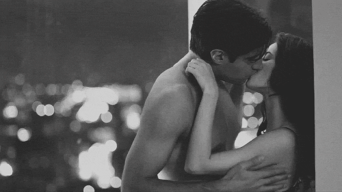 Pinned up against wall kiss gif
